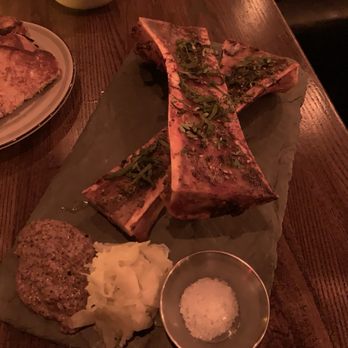 The East End - BONE MARROW harrisa roasted beef bone, toast points, chili cumin mustard, lime pickled fennel, zaatar, mint, parsley - American Near Me - Providence, Rhode Island