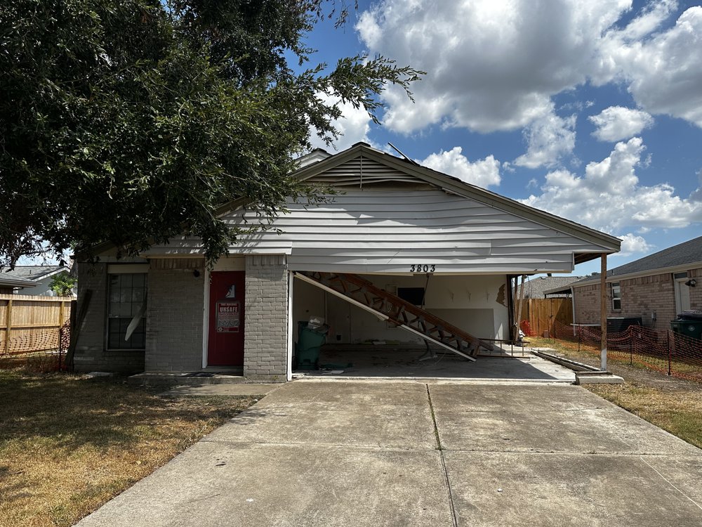 Slide of Space City Roofers