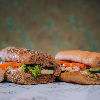 City Bites - a variety of sandwiches on a newspaper - Sandwiches Near Me - Yukon, Oklahoma City Bites - a variety of sandwiches on a newspaper - Sandwiches Near Me - Yukon, Oklahoma