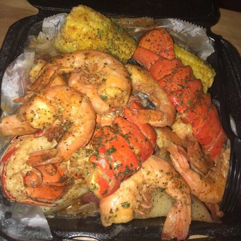 Fiyah Island Grill - Love affair platter from the pop up shop of king crab atl. Delicious food even if I did fall horribly on the way out the door! - Caribbean Near Me - Baltimore, Maryland