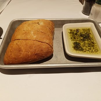 Bonefish Grill - Toasted Bread with a side of Extra Virgin Olive Oil mixed with herbs for dipping. - Seafood Near Me - King Of Prussia, Pennsylvania Bonefish Grill - Toasted Bread with a side of Extra Virgin Olive Oil mixed with herbs for dipping. - Seafood Near Me - King Of Prussia, Pennsylvania