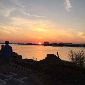 Atlantic Salt Co - a man and a woman watching the sunset - Specialty Food Near Me - Staten Island, New York Atlantic Salt Co - a man and a woman watching the sunset - Specialty Food Near Me - Staten Island, New York
