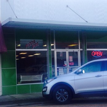 Pizza Pro - a car parked in front of a restaurant - Pizza Near Me - Marks, Mississippi Pizza Pro - a car parked in front of a restaurant - Pizza Near Me - Marks, Mississippi