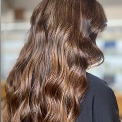 Rich chocolate tones and soft golden highlights for a luminous natural look by Dasha