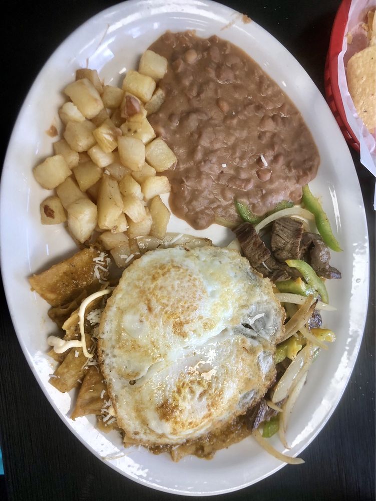 Taqueria Flores Logo