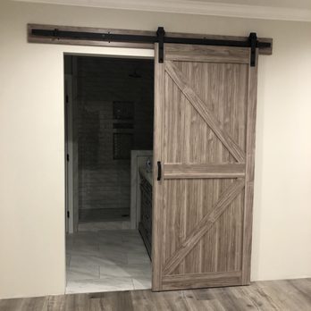 Lightning Construction Co - Master en suite with barnyard door - General Contractors Near Me