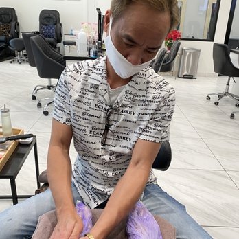 Empress Beauty Bar - Ken doing his magic with the paraphin wax - Hair Salons Near Me - Arlington, Texas Empress Beauty Bar - Ken doing his magic with the paraphin wax - Hair Salons Near Me - Arlington, Texas