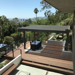 Our pergola is 17' square and the dark grey/slate color. Perimeter down lights and chandelier each have their own switch. Our pergola is 17' square and the dark grey/slate color. Perimeter down lights and chandelier each have their own switch.
