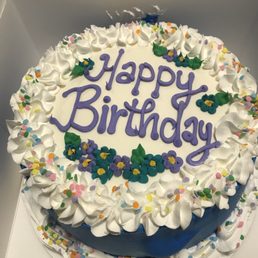Ice cream cake with yellow cake, chocolate Oreo ice cream with chocolate fudge and crunchy cookie in the middle and icing on top. Ice cream cake with yellow cake, chocolate Oreo ice cream with chocolate fudge and crunchy cookie in the middle and icing on top.