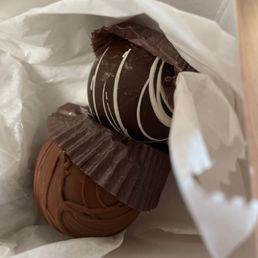 Truffles shoved into the box after I asked for them to not be shoved into the bottom of this large bag.