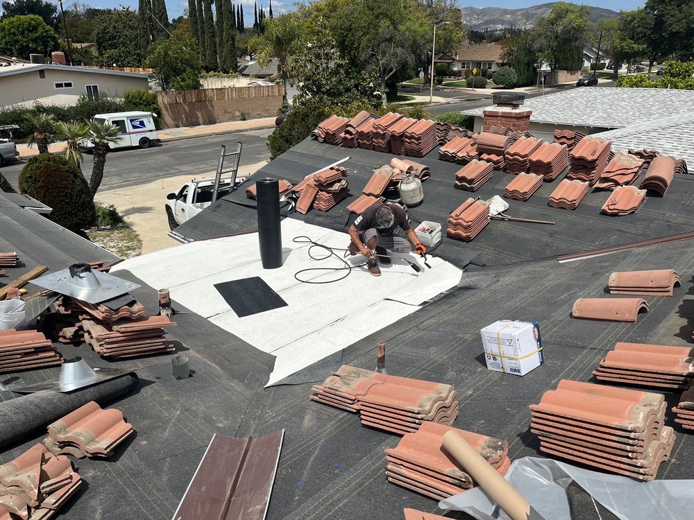 Slide of Quiroz And Sons Roofing