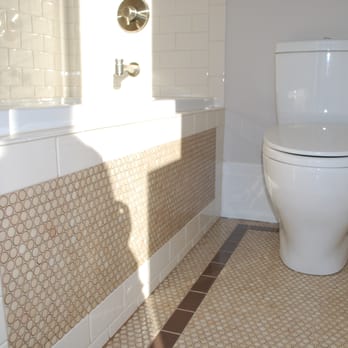 Mosaicos Tile - a white toilet in a bathroom - Building Supplies Near Me - Chicago, Illinois