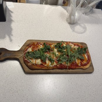 Beacon Bar & Kitchen - SWEET & SPICY flatbread Pepperoni, mozzarella, baby arugula, hot honey - New American Near Me - Queens, New York Beacon Bar & Kitchen - SWEET & SPICY flatbread Pepperoni, mozzarella, baby arugula, hot honey - New American Near Me - Queens, New York