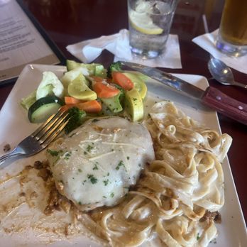 Mike's Grillhouse - Chicken Parmesan with fettuccini Alfredo! - American Near Me - Modesto, California Mike's Grillhouse - Chicken Parmesan with fettuccini Alfredo! - American Near Me - Modesto, California