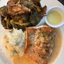 Citrus glazed salmon, potatoes and fried Brussel sprouts