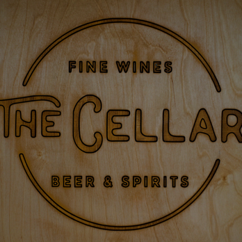 The Cellar - a wooden sign with the words fine wines - Beer, Wine & Spirits Near Me - Taos, New Mexico The Cellar - a wooden sign with the words fine wines - Beer, Wine & Spirits Near Me - Taos, New Mexico
