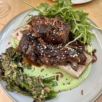 Delara - Braised beef short rib with broccolini & arugula and a lovely green sauce - Persian/Iranian Near Me - Vancouver, British Columbia Delara - Braised beef short rib with broccolini & arugula and a lovely green sauce - Persian/Iranian Near Me - Vancouver, British Columbia
