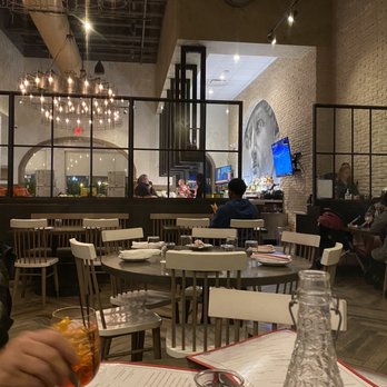 Grana - Nice ambience from the rear of the restaurant looking toward the bar and front area. - Italian Near Me - Atlanta, Georgia Grana - Nice ambience from the rear of the restaurant looking toward the bar and front area. - Italian Near Me - Atlanta, Georgia