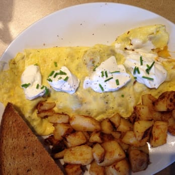 Eat - Bacon, potato, and sour cream omelet with home fries and toast. - Breakfast & Brunch Near Me - Springfield, Massachusetts Eat - Bacon, potato, and sour cream omelet with home fries and toast. - Breakfast & Brunch Near Me - Springfield, Massachusetts