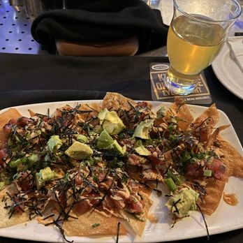 Yard House - Tuna Poke Nachos and a 3 Daughter's Cider drink - New American Near Me - Orlando, Florida