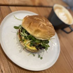 Smoking Gun Coffee Roasters - Breakfast sando- absolutely yummy! (eggs, prosciutto, cheese, greens)