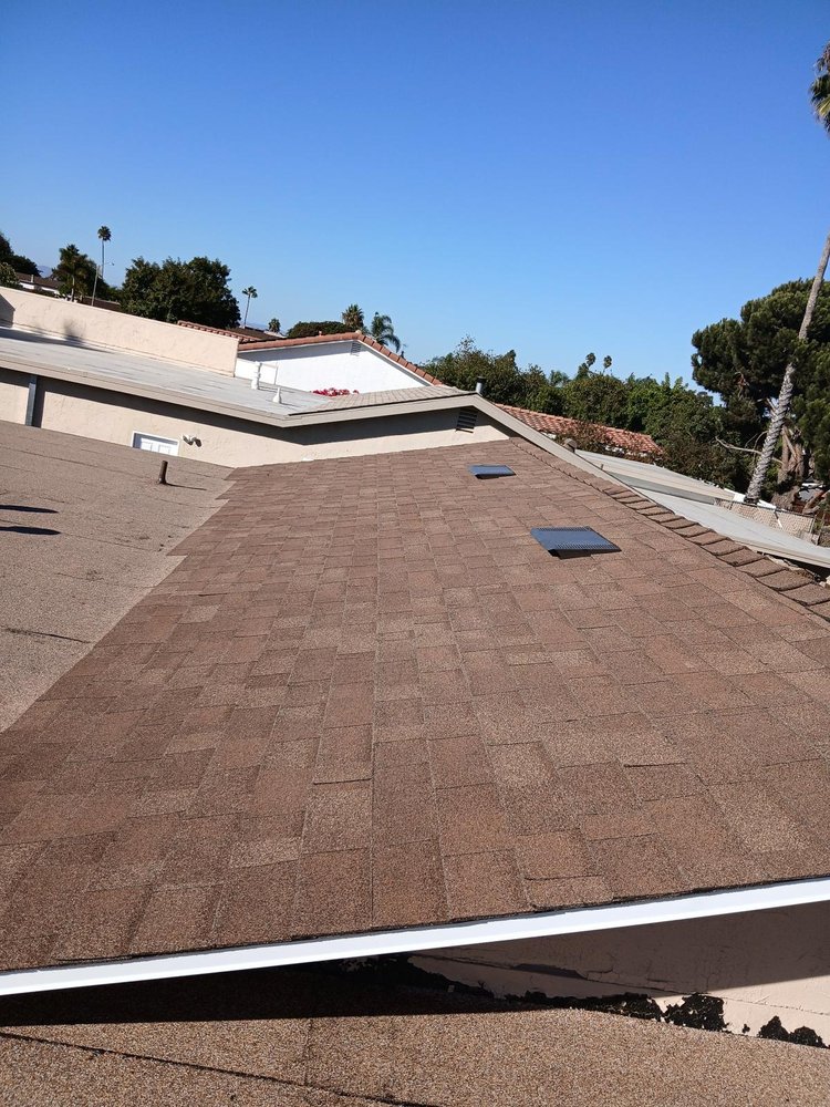 Slide of Mister Roofing