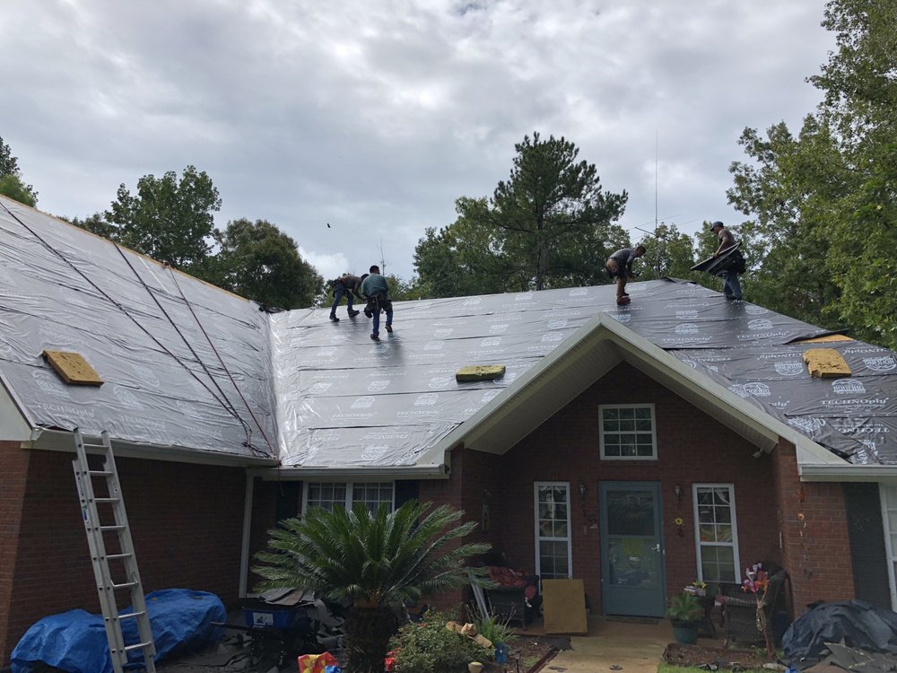 Slide of All About Roofing & Construction