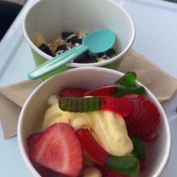 Yogurtini - Pineapple Whip yogurt with fresh strawberries, gummy worms, and peach rings. - Ice Cream & Frozen Yogurt Near Me - Phoenix, Arizona