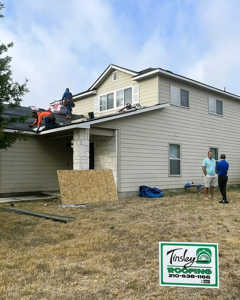 Slide of Tinsley Roofing