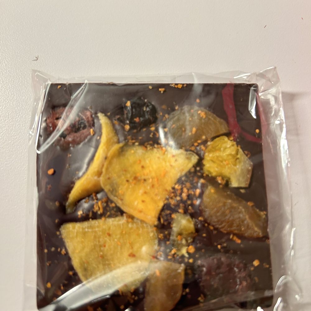 Menchaca Chocolates - a chocolate covered with orange peels - Chocolatiers & Shops Near Me - Santa Barbara, California Menchaca Chocolates - a chocolate covered with orange peels - Chocolatiers & Shops Near Me - Santa Barbara, California