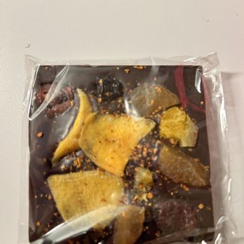 Menchaca Chocolates - a chocolate covered with orange peels - Chocolatiers & Shops Near Me - Santa Barbara, California