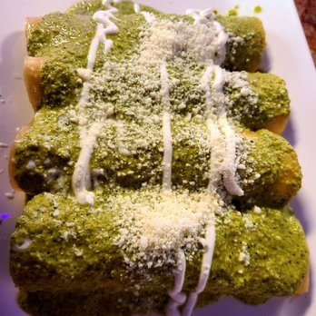 Mi Casa - Enchiladas made w/ fresh corn tortillas, stuffed with plenty and tasty shredded chicken, and topped with a delicious green poblano sauce! - New Mexican Cuisine Near Me - Jacksonville, Florida