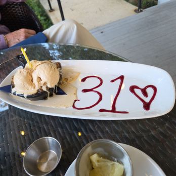 Heritage 485 - The anniversary surprise dessert. Apple smash cake a la mode. - Mediterranean Near Me - Prince Frederick, Maryland