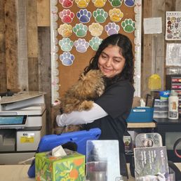 My 3 month old puppy and one of the awesome workers that he liked My 3 month old puppy and one of the awesome workers that he liked