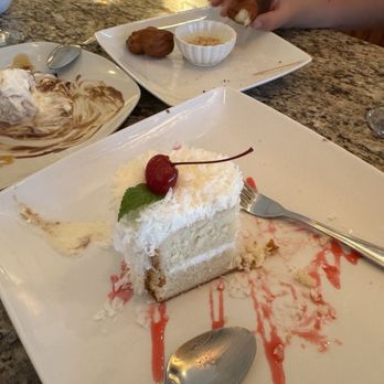 Thai Lanna 2 - Coconut Cake. Left , coconut ice cream with banana coins; Right, Thai donuts. All half eaten :) - Thai Near Me - Port Richey, Florida Thai Lanna 2 - Coconut Cake. Left , coconut ice cream with banana coins; Right, Thai donuts. All half eaten :) - Thai Near Me - Port Richey, Florida
