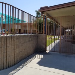 Coded security gate to enter school area (door 1 of 2)