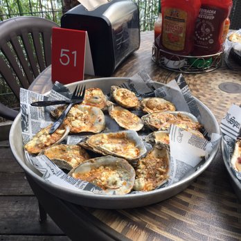 Doc's Oyster Bar - dozen baked speciality oysters - Dive Bars Near Me - Valparaiso, Florida