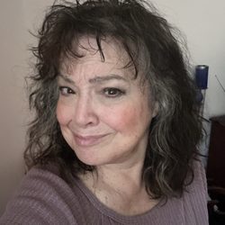 Douglas J Salon - They talked me out of another perm because of the damage and coloring I had and some broken hair so Kami gave me a layered cut..