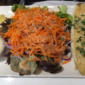 Quinlan's Seafood Bar - Sea Bass and Salad - Seafood Near Me - Killarney, Kentucky