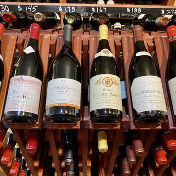 Wine Wise - a wine rack full of wine bottles - Beer, Wine & Spirits Near Me - Greenwich, Connecticut