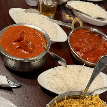Swagat Indian Cuisine - Butter Chicken (left) and Chicken Vindaloo (right) - Indian Near Me - Baton Rouge, Louisiana Swagat Indian Cuisine - Butter Chicken (left) and Chicken Vindaloo (right) - Indian Near Me - Baton Rouge, Louisiana