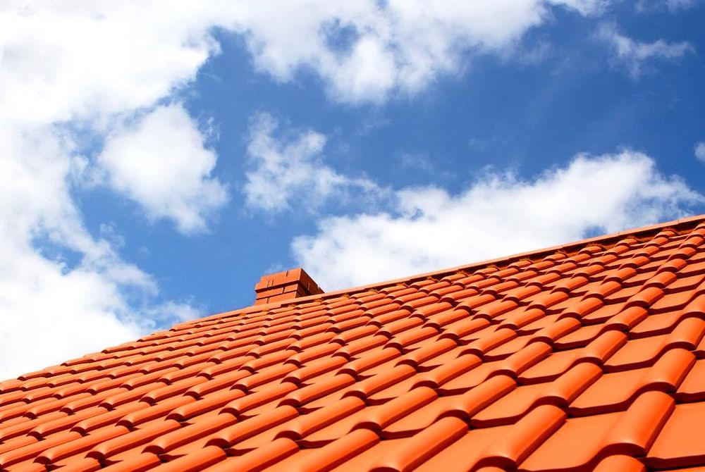 Slide of Mendez Roofing