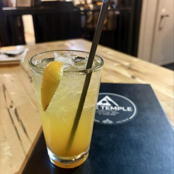 The Temple Kitchen + Bar - Lilikoi Booch Tea - This was one of the most decent items off the menu. - Cocktail Bars Near Me - Kailua-Kona, Hawaii