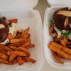 Gobble Stop Smokehouse - Sliced smoked turkey melt and MCB (marinated chicken breast) sandwiches with sweet potato fries