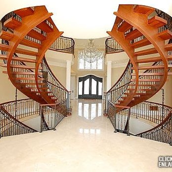 IBD - International Brown Developments - a spiral staircase - General Contractors Near Me - Tottenham, Ontario IBD - International Brown Developments - a spiral staircase - General Contractors Near Me - Tottenham, Ontario
