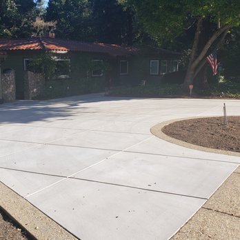 Kodiak Construction - Concrete driveway with exposed aggregate borders and aprons. - Masonry/Concrete Near Me Kodiak Construction - Concrete driveway with exposed aggregate borders and aprons. - Masonry/Concrete Near Me