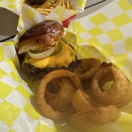 Burgers, onion rings, and fries. Burgers, onion rings, and fries.