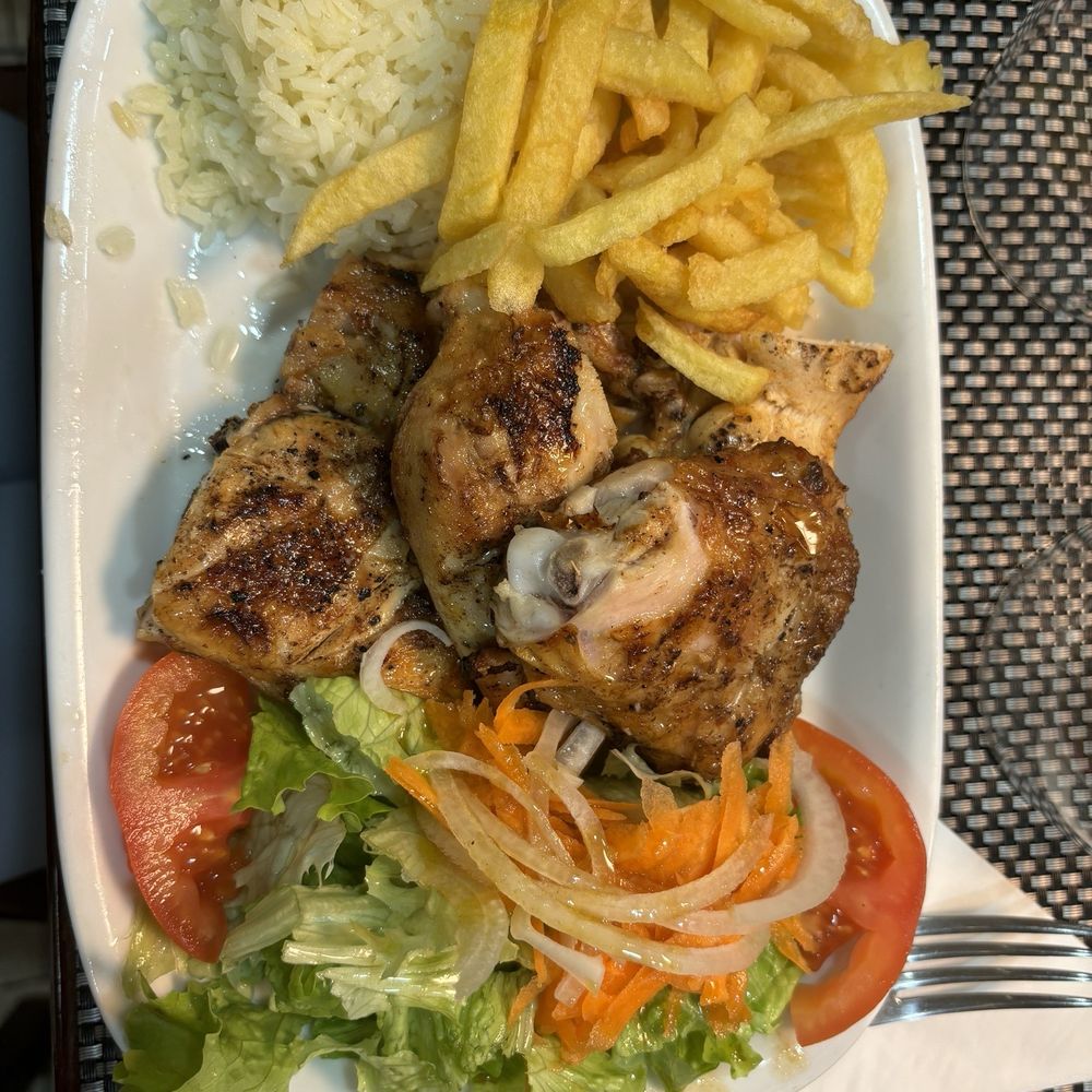 Fome de Leão - 1/2 Frango with rice and fries - Portuguese Near Me - Lisbon, 11 Fome de Leão - 1/2 Frango with rice and fries - Portuguese Near Me - Lisbon, 11