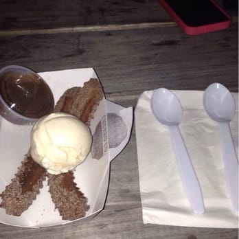 Churro Co - Traditional topped with ice cream and chocolate sauce on the side - Desserts Near Me - Austin, Texas Churro Co - Traditional topped with ice cream and chocolate sauce on the side - Desserts Near Me - Austin, Texas