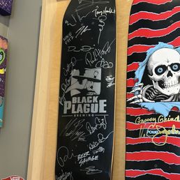 Black plague tribute board with tons of signatures on it, including Tony Hawk Black plague tribute board with tons of signatures on it, including Tony Hawk